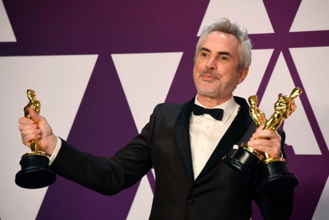 HOLLYWOOD, CALIFORNIA - FEBRUARY 24: Alfonso Cuaron, winner of Best Foreign Language Film, Best Director and Best Cinematography for