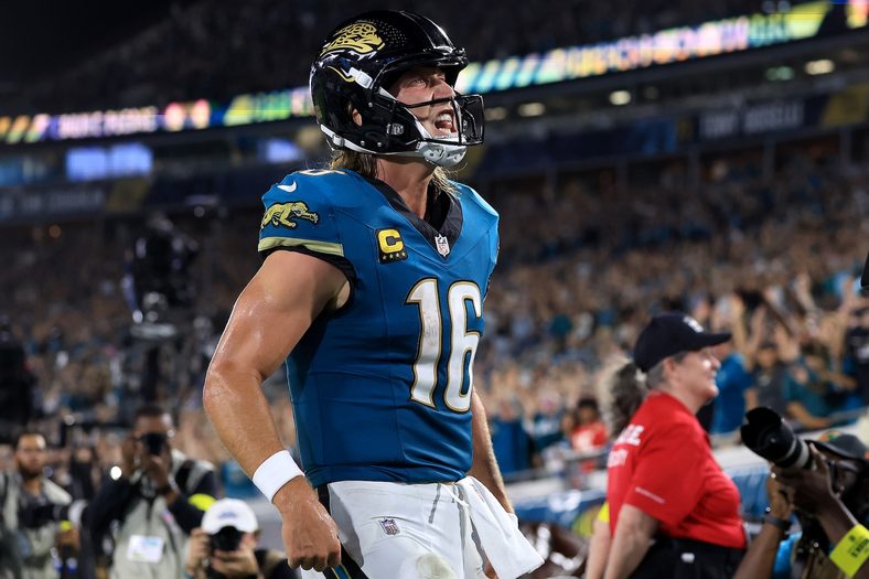 Trevor Lawrence #16 of the Jacksonville Jaguars celebrates a touchdown against the Kansas City Chiefs in the third quarter at EverBank Stadium on October 06