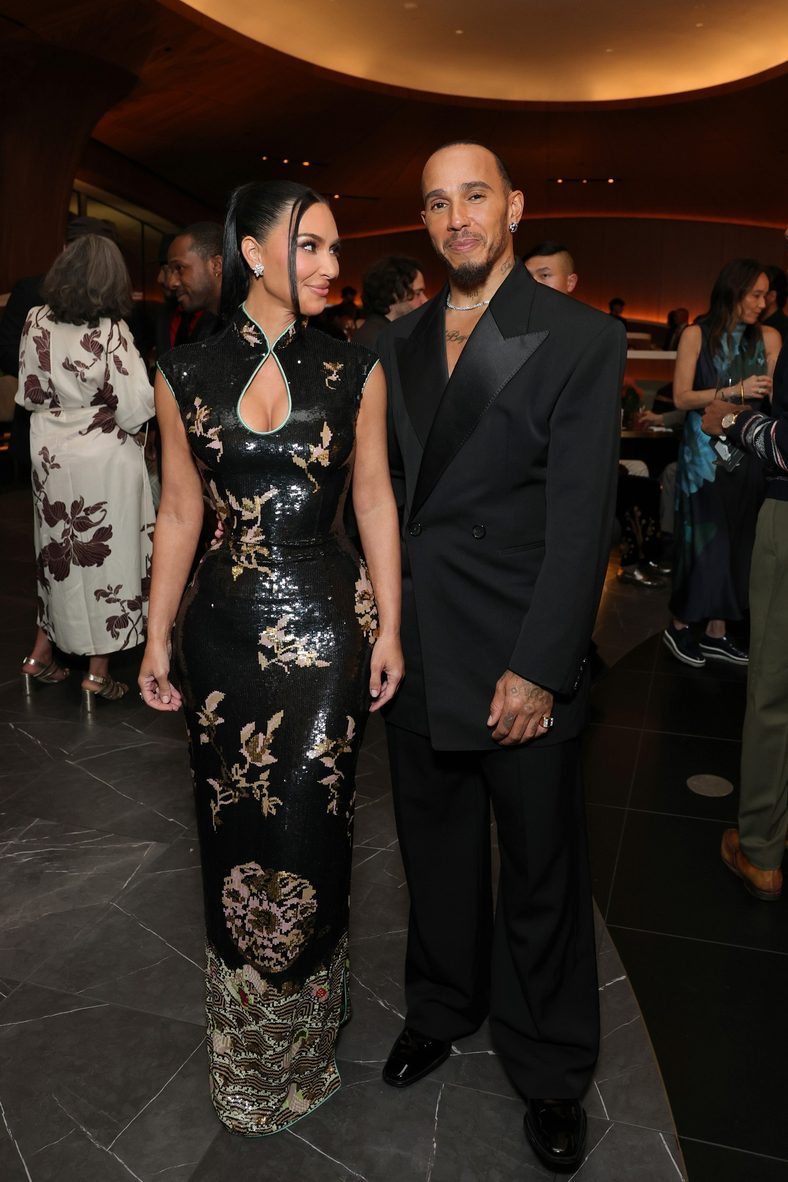 Kim Kardashian and Lewis Hamilton pose together at the opening of the Lucas Museum