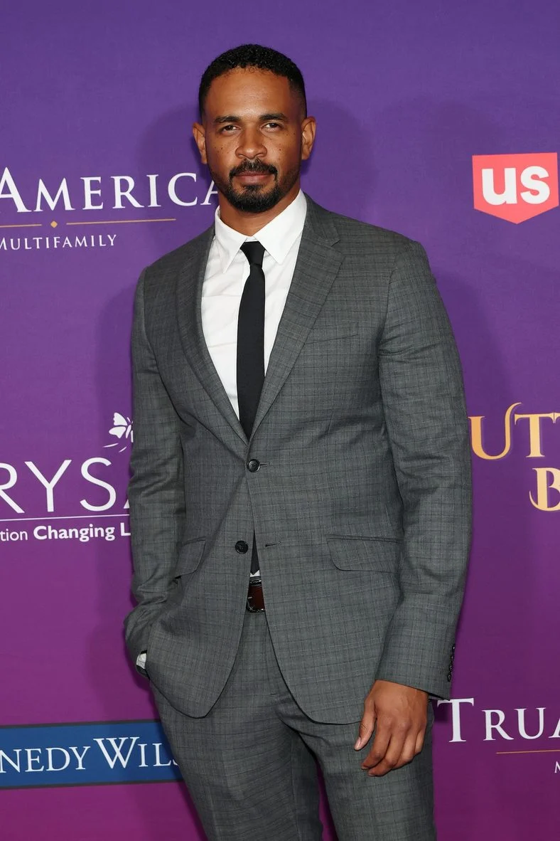 Damon Wayans Jr. poses on the carpet at the Butterfly Chrysalis Ball