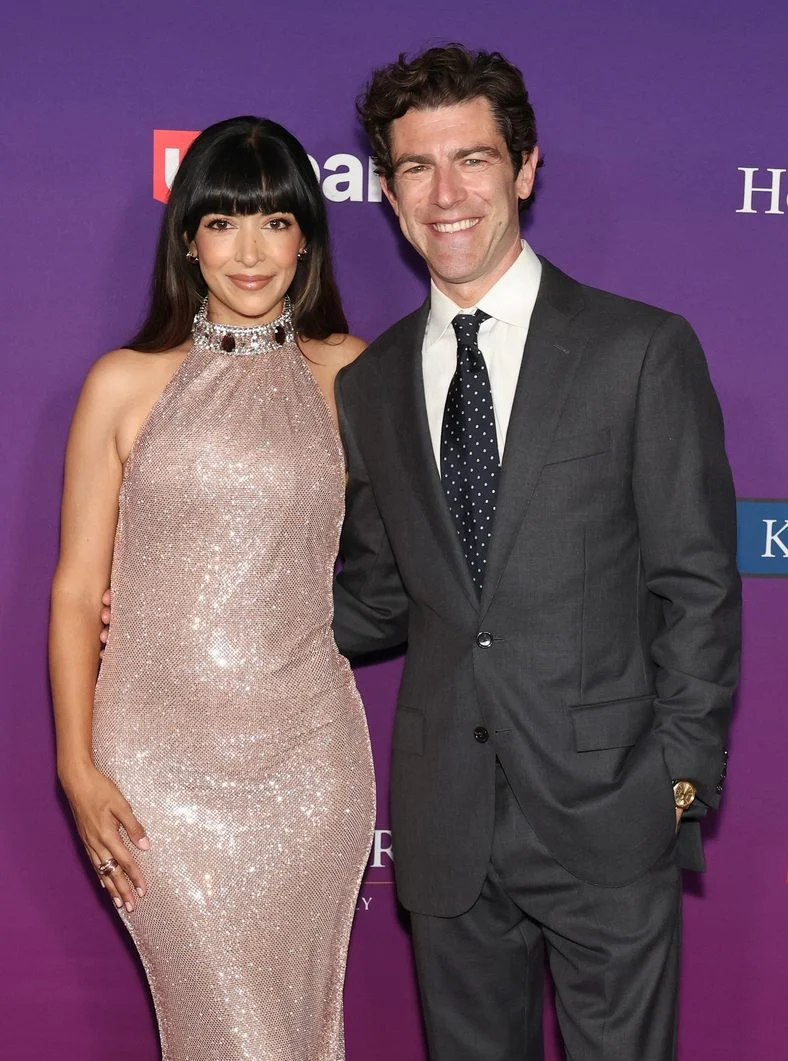 Hannah Simone and Max Greenfield pose on the carpet at the Chrysalis Butterfly Ball