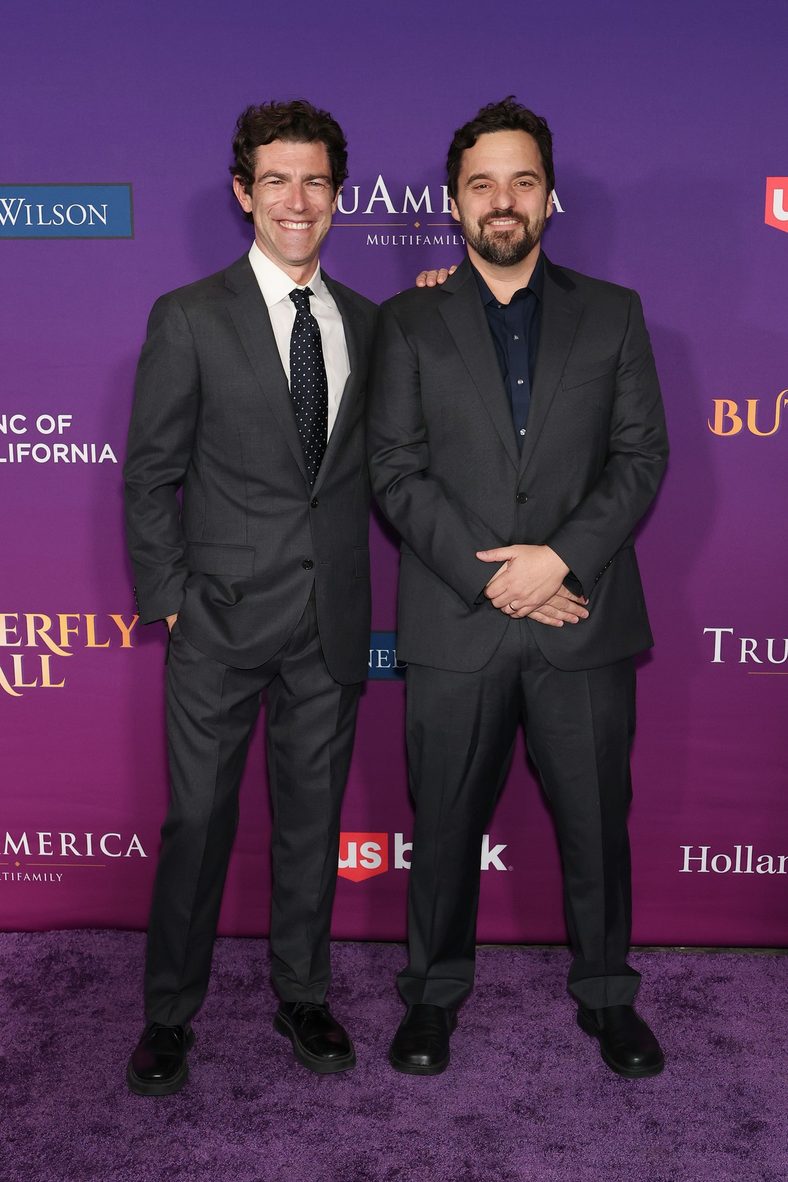 Max Greenfield and Jake Johnson pose on the carpet at the Chrysalis Butterfly Ball