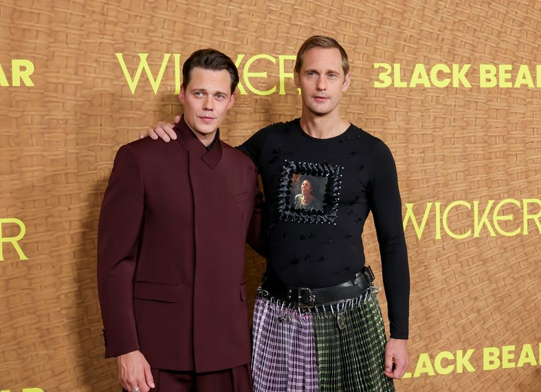 Bill Skarsgard and Alexander Skarsgard pose on the carpet at the Los Angeles premiere of his new movie Wicker
