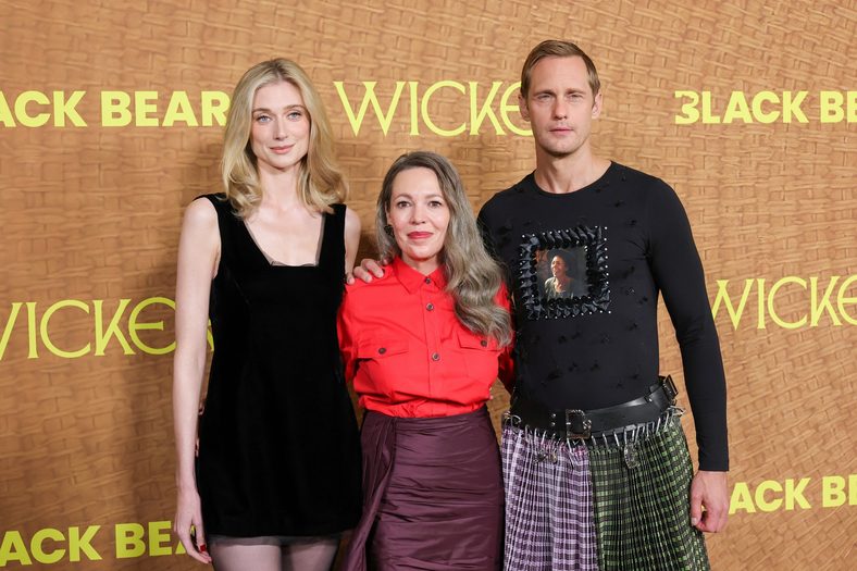 Elizabeth Debicki, Olivia Colman and Alexander Skarsgard pose together at the Wicker premiere in Los Angeles