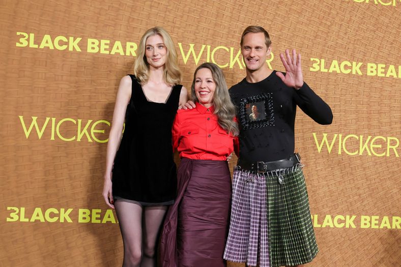 Elizabeth Debicki, Olivia Colman and Alexander Skarsgard pose together at the Wicker premiere in Los Angeles